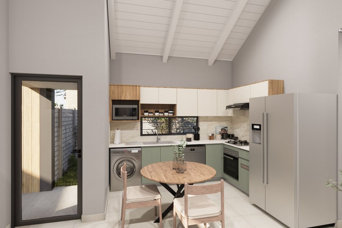Modern kitchen featuring sleek cabinetry, stone countertops, integrated appliances, and a high vaulted ceiling with exposed beams, creating a bright and functional space.