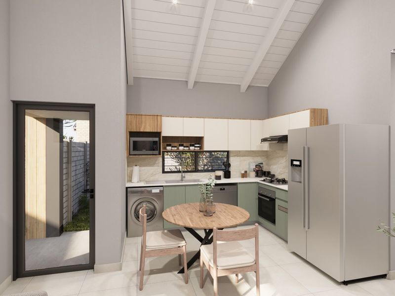 Modern kitchen featuring sleek cabinetry, stone countertops, integrated appliances, and a high vaulted ceiling with exposed beams, creating a bright and functional space.