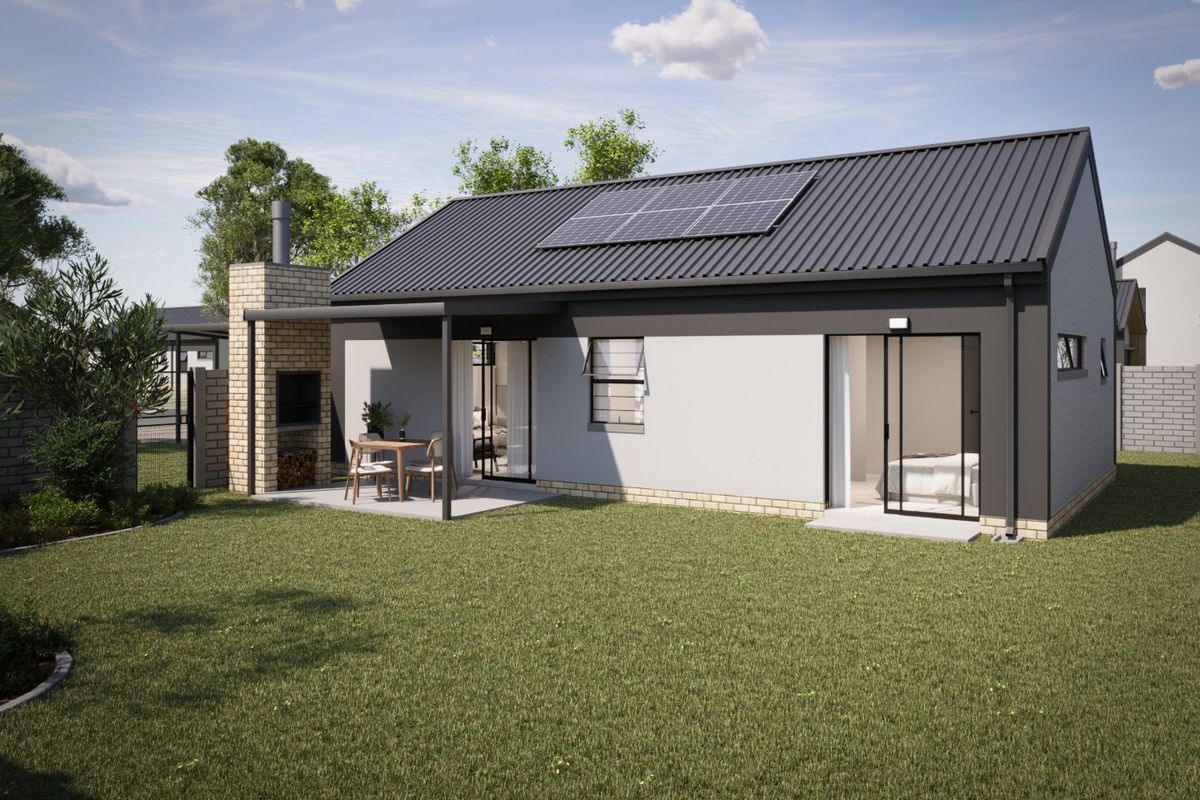 Rear view of a modern house featuring a covered patio with a built-in brick fireplace, solar panels on the roof, and a landscaped garden.