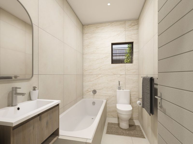 A modern, well-appointed bathroom featuring a built-in vanity, bathtub, and toilet with neutral floor-to-ceiling tiling and contemporary fixtures.