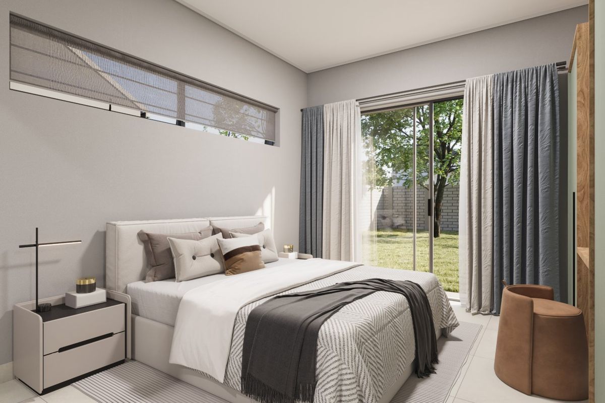 A modern, well-lit bedroom featuring tiled flooring, a clerestory window, and a sliding glass door providing direct access to the garden.