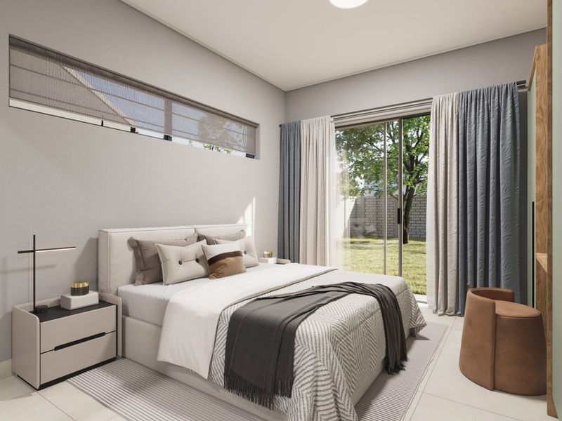 A modern, well-lit bedroom featuring tiled flooring, a clerestory window, and a sliding glass door providing direct access to the garden.