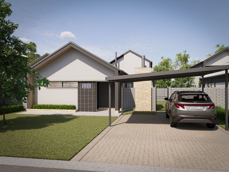 Modern single-story residential facade featuring a clean brick finish, covered carport, and well-maintained front lawn.