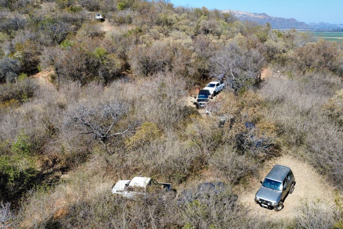 An aerial view of the farm property showcasing the natural bushveld landscape and existing dirt access tracks.