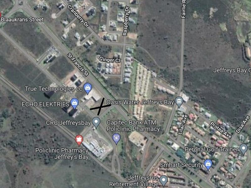 An aerial satellite view showing the location of the residential land plot within the surrounding neighborhood infrastructure.