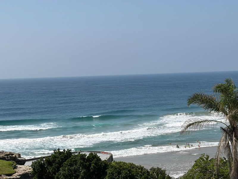 A scenic elevated view overlooking the ocean and coastline.