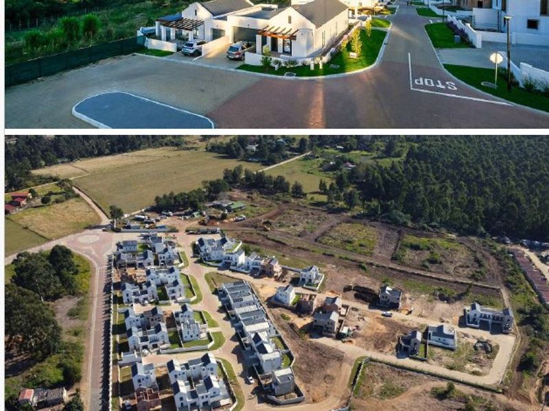Aerial view of the Mountain View Estate, showcasing the residential layout, paved infrastructure, and surrounding natural landscape.