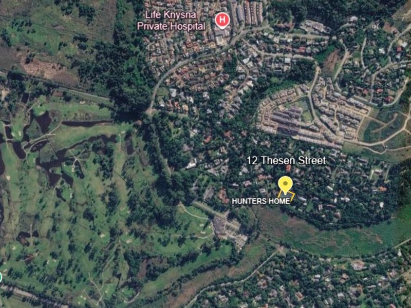 An aerial satellite view showing the location of the property in Hunters Home, Knysna, relative to local landmarks and the surrounding residential area.
