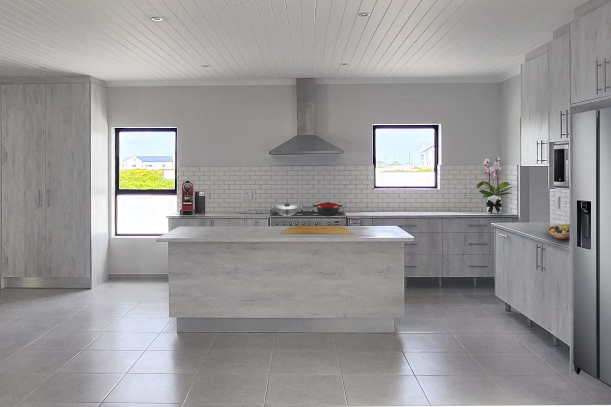 Modern kitchen featuring light wood-grain cabinetry, a central island, subway tile backsplash, stainless steel appliances, and recessed lighting under a tongue and groove ceiling.