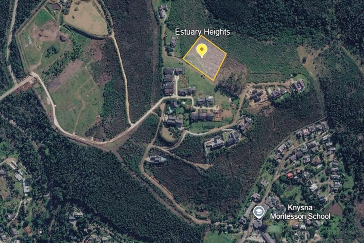 Aerial satellite view of the residential land plot located in Estuary Heights, showing surrounding vegetation and nearby residential development.