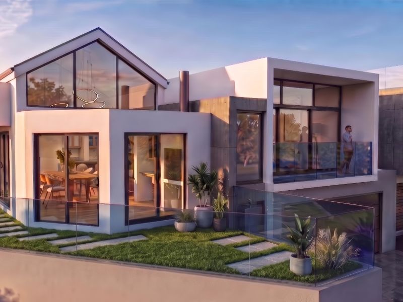 Modern architectural rear elevation featuring expansive glass windows, a sleek glass balustrade, and a landscaped stepped garden pathway.