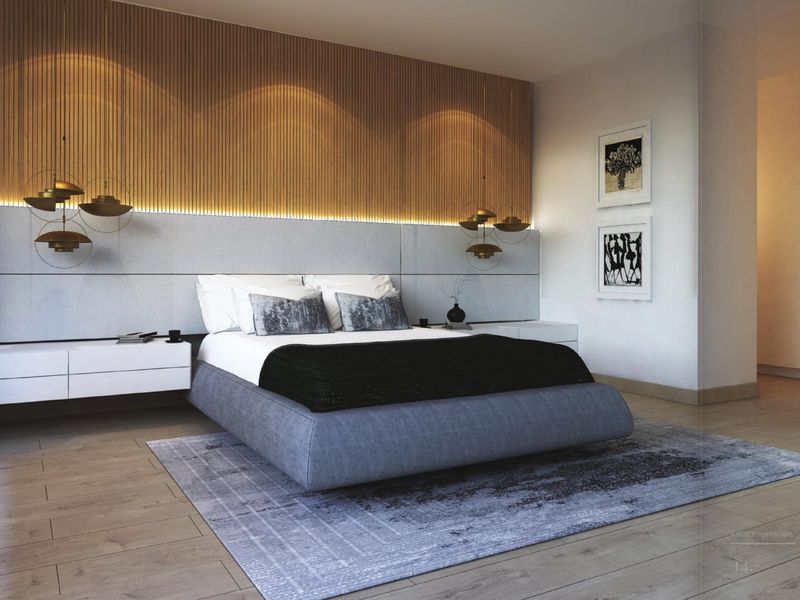 Modern bedroom featuring a timber slat feature wall with integrated LED lighting and floating bedside cabinetry, finished with high-quality timber flooring.