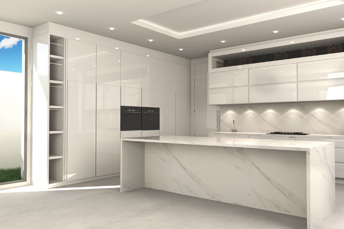 Modern, high-end kitchen featuring sleek white cabinetry, a marble-topped island, integrated appliances, and recessed lighting, creating a clean and sophisticated culinary space.