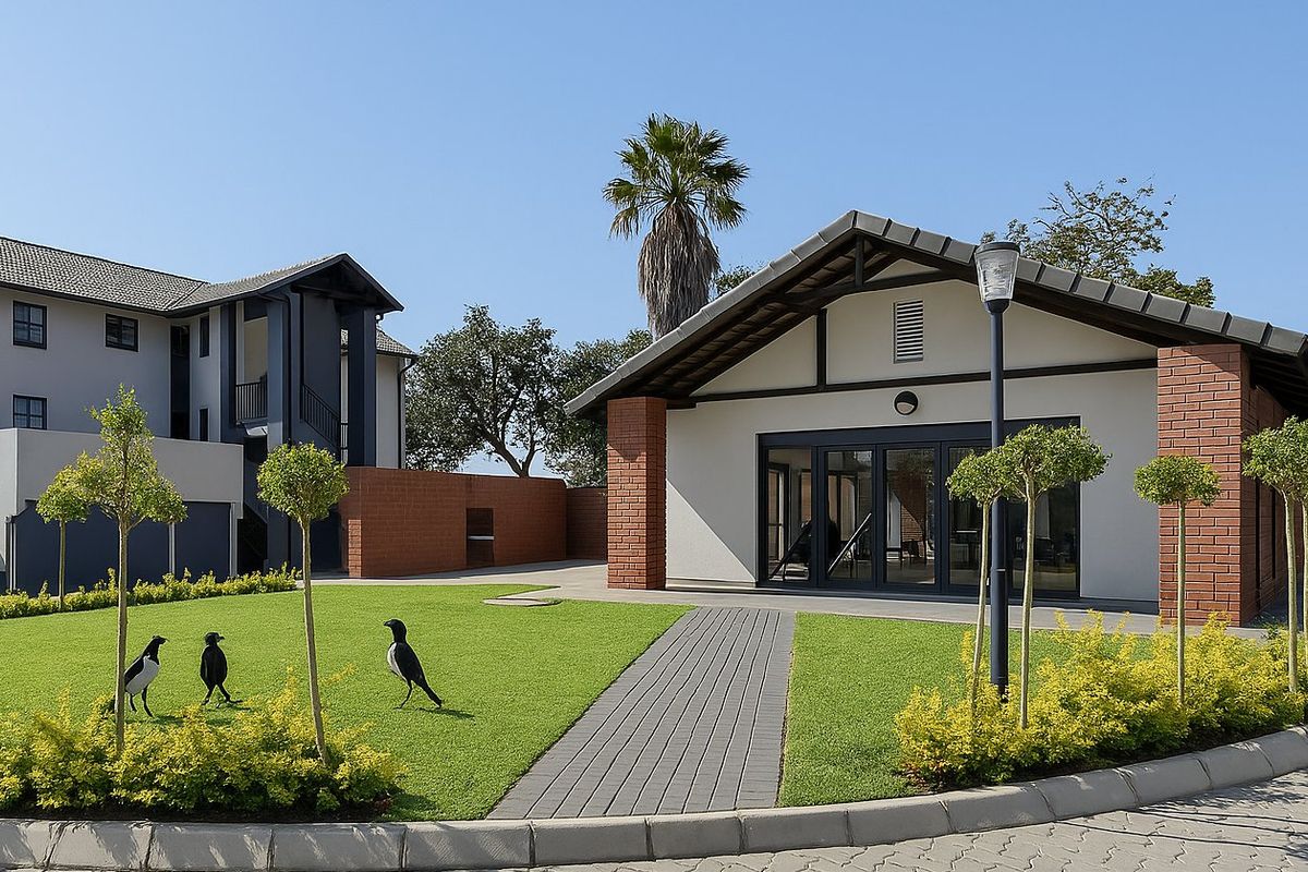A well-maintained exterior view of a modern apartment complex featuring a landscaped lawn, paved walkway, and a building with brick accents and bi-fold doors.