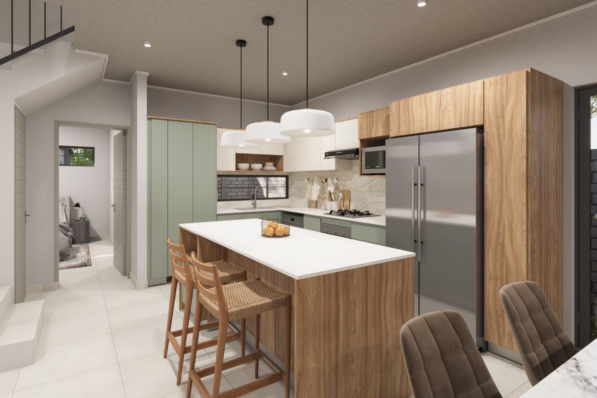Modern open-plan kitchen featuring a central island, wood-grain and sage cabinetry, stone countertops, and integrated appliances with contemporary pendant lighting.
