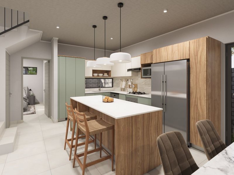 Modern open-plan kitchen featuring a central island, wood-grain and sage cabinetry, stone countertops, and integrated appliances with contemporary pendant lighting.