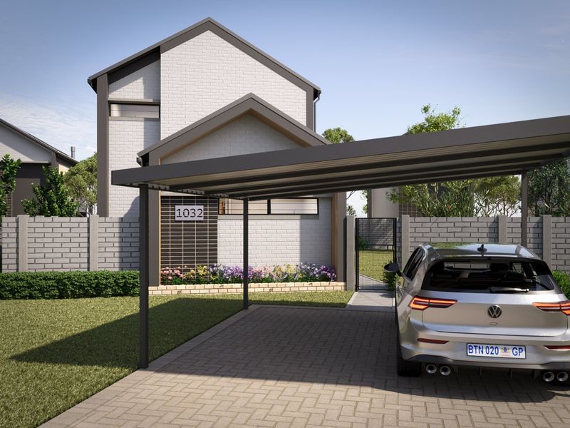 Modern residential front elevation featuring a paved driveway, covered carport, and secure brick boundary wall with a pedestrian gate.