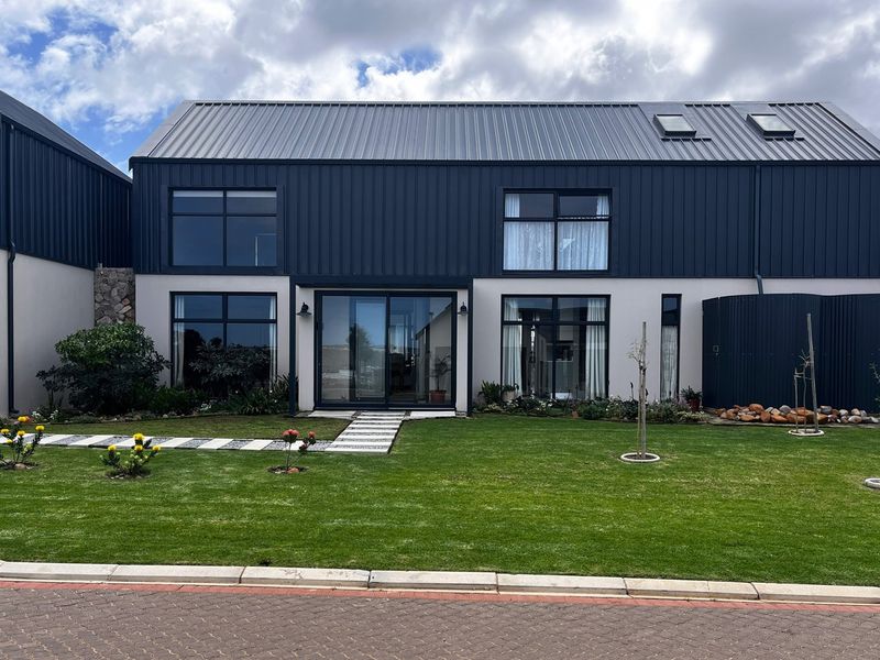NORTH-FACING FAMILY HOME WITH MOUNTAIN VIEWS IN RENOSTERBOS - Photo 2