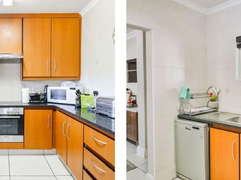 A functional kitchen featuring wooden cabinetry, granite countertops, built-in oven, and tiled finishes, providing a practical workspace with integrated appliance connections.