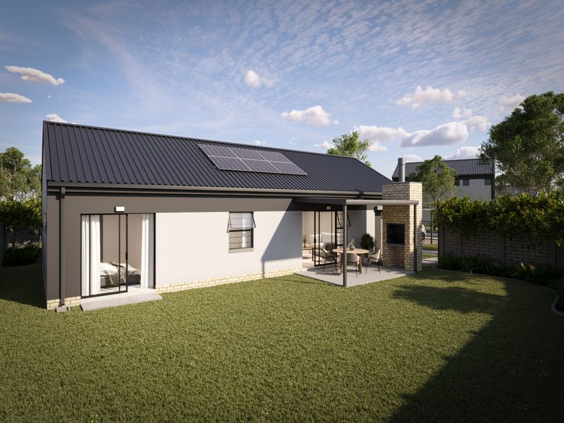Rear view of a modern house featuring a metal roof with solar panels, a covered patio with a built-in brick fireplace, and a private garden.