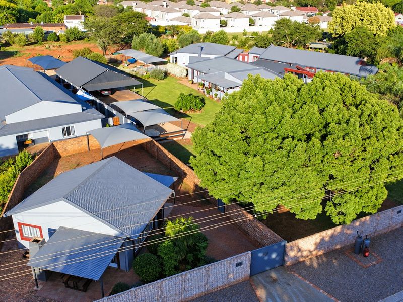 Exceptional 1-Hectare Montana Gardens Property with Business Rights and Multiple Accommodation Options - Photo 4