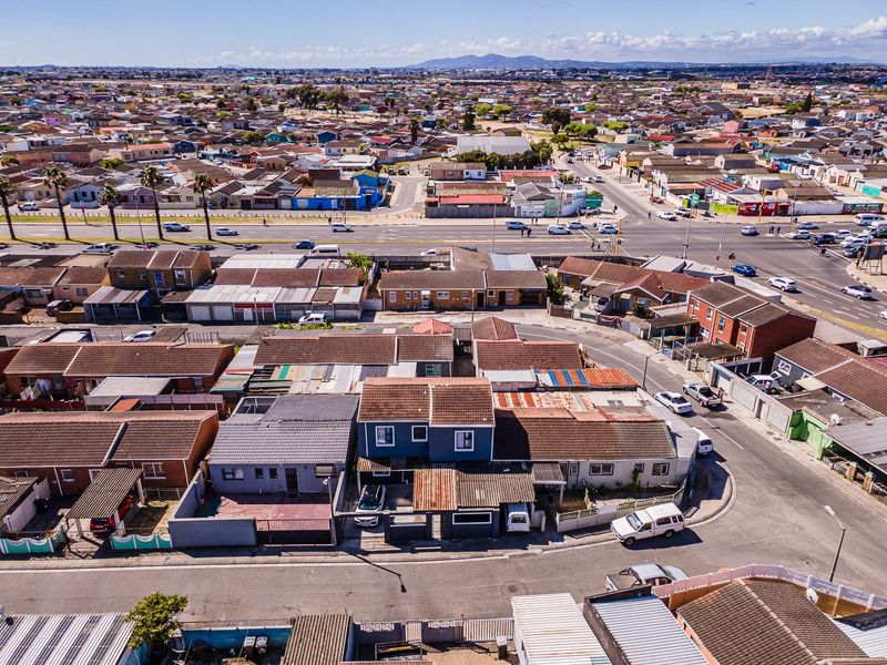 An aerial view of the residential property showing the roof structure, driveway, and surrounding neighbourhood context.