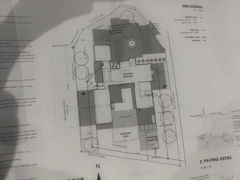 Architectural site plan showing the proposed dwelling, pool, and landscaping layout for the residential property.