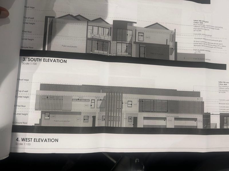 Architectural elevation drawings showing the proposed south and west facades of the residential property, including material specifications and structural details.