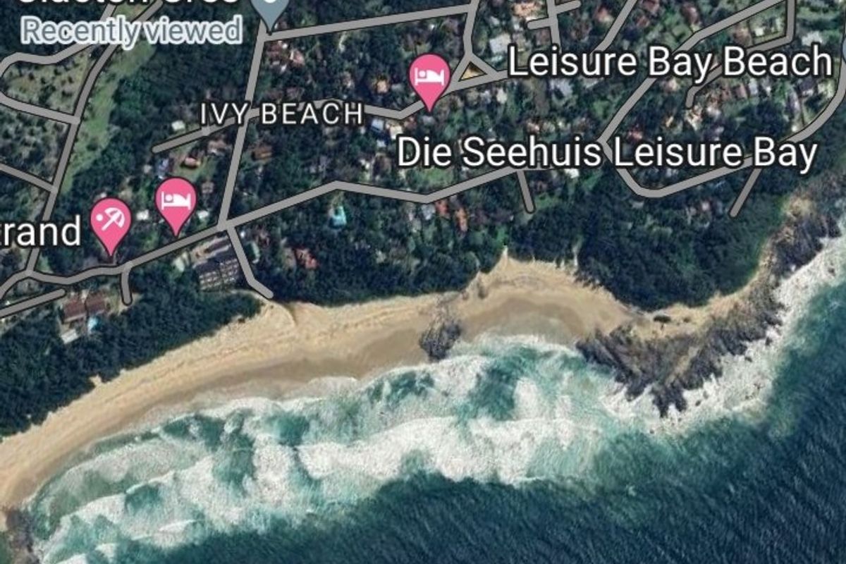 An aerial map view showing the location of the vacant land parcel in relation to the coastline and local street network.