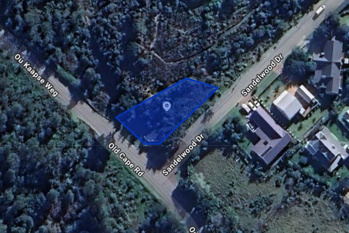 Aerial view of a vacant residential plot situated at the intersection of Sandelwood Drive and Old Cape Road, featuring natural vegetation.