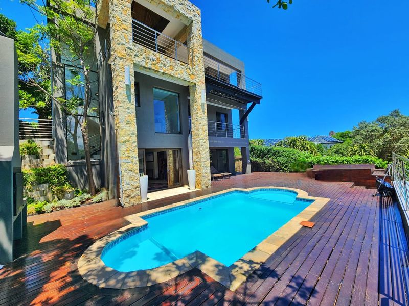 Luxurious multi level home in a gated estate with ocean views. - Photo 2