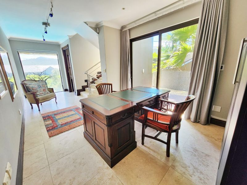 Luxurious multi level home in a gated estate with ocean views. - Photo 8