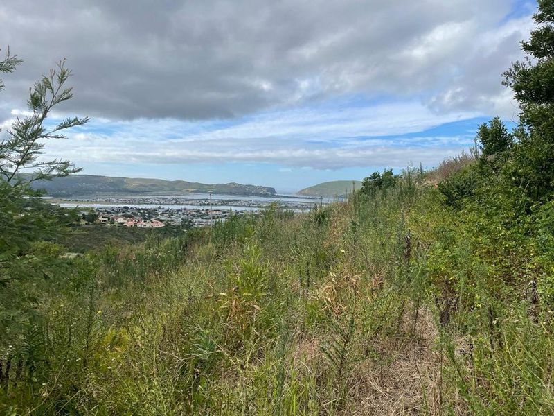 Elevated view overlooking the lagoon and surrounding landscape from the vacant residential plot.