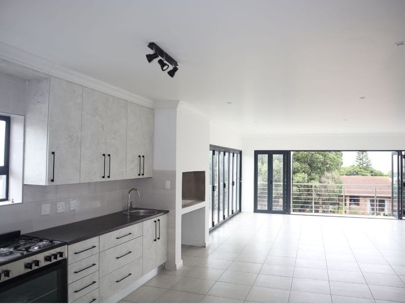 Modern 5-Bedroom Family Home in Wavecrest – Spacious, Stylish & Coastal Living - Photo 6