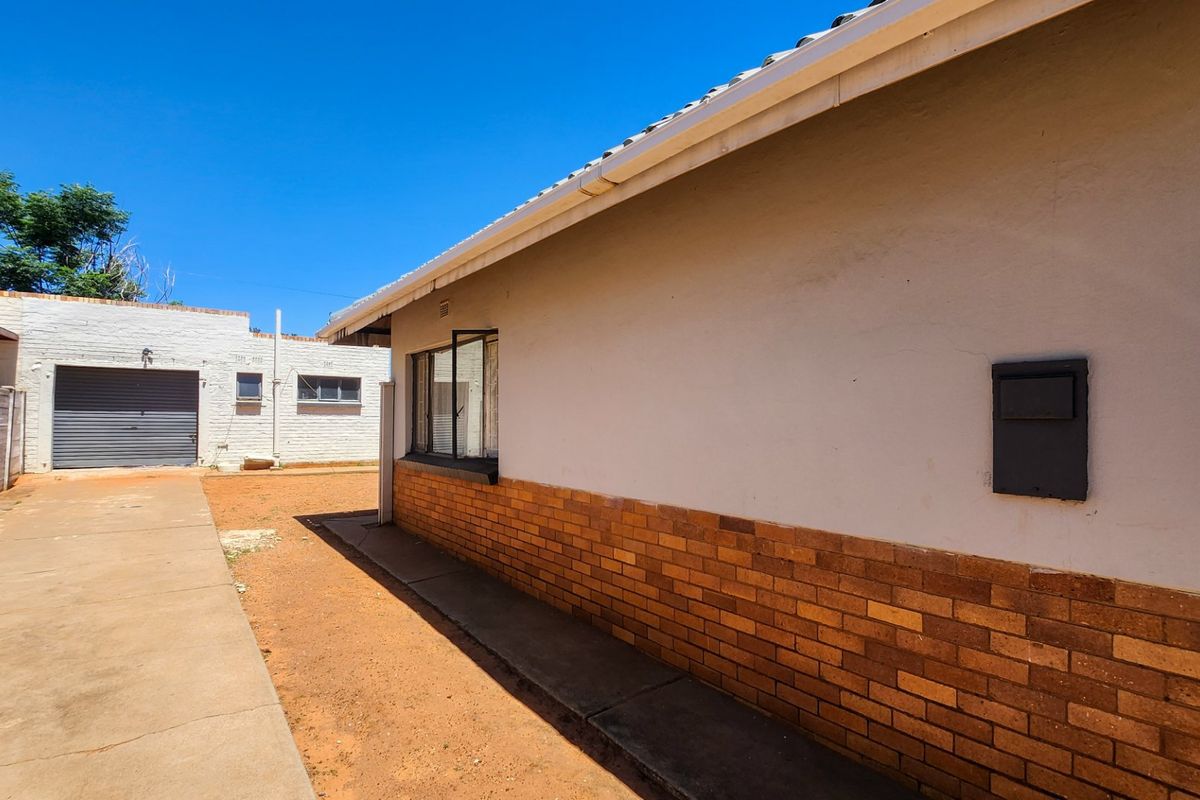 Affordable 3-Bedroom Home with Secure Yard and Garage! - Photo 2