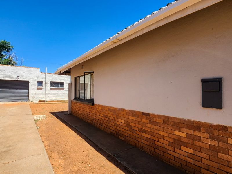 Affordable 3-Bedroom Home with Secure Yard and Garage! - Photo 2