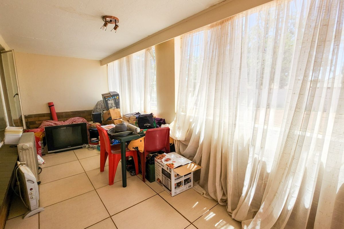 Affordable 3-Bedroom Home with Secure Yard and Garage! - Photo 5