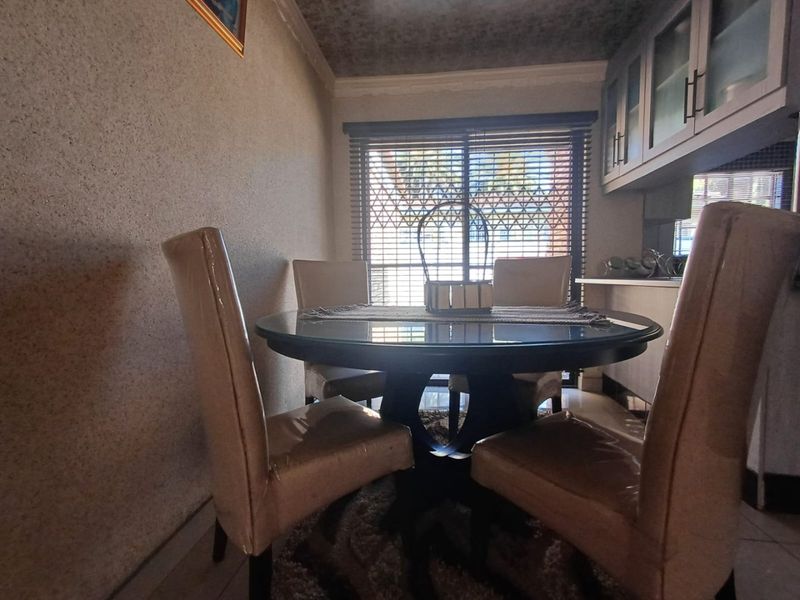 Charming Family Home with Rental Opportunity in Freemanville, Klerksdorp! - Photo 6