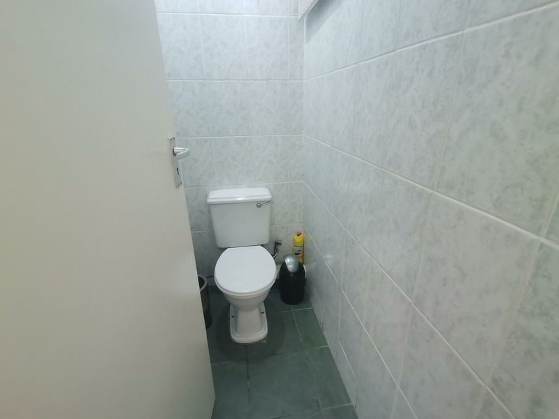 First floor corner unit with wrap around balcony and slight sea view through the trees - Photo 9