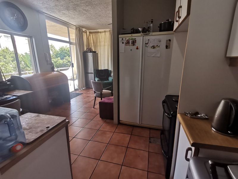 First floor corner unit with wrap around balcony and slight sea view through the trees - Photo 6