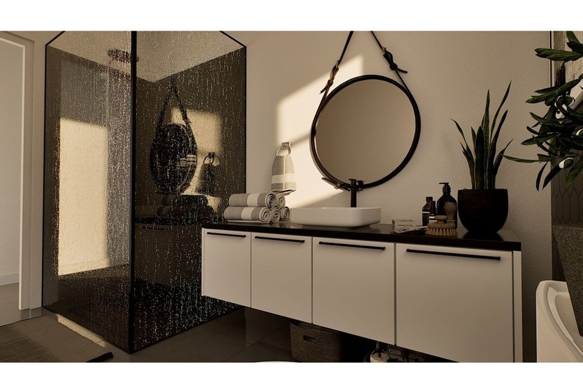 Modern bathroom featuring a sleek floating vanity with a vessel sink and a spacious walk-in shower with a black-framed glass enclosure.