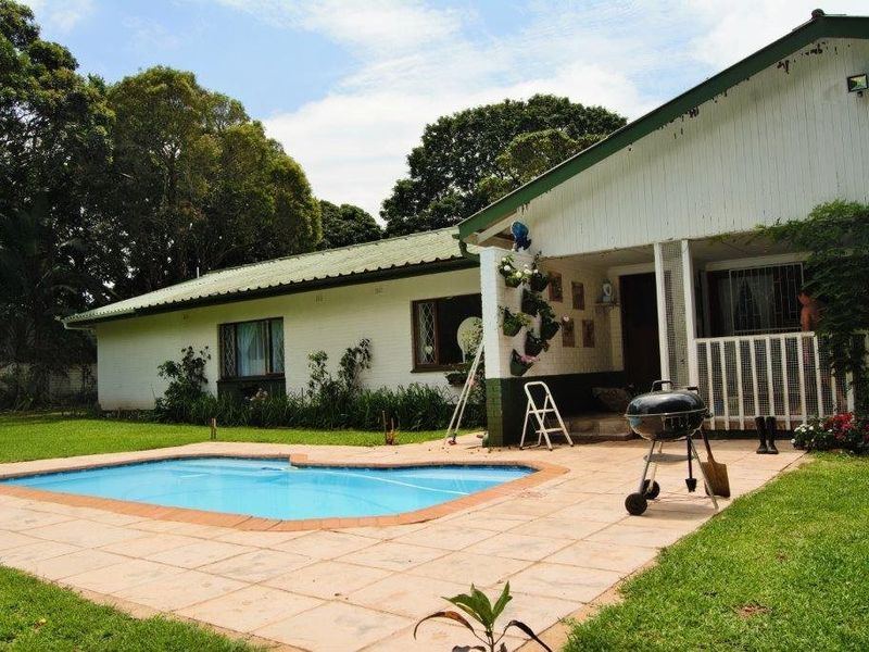 Beautiful Farm Style Home with an Expansive Garden! - Photo 2