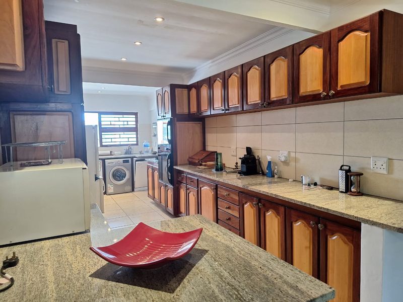 Exquisite double-storey Facebrick home with Lagoon Views - Photo 6