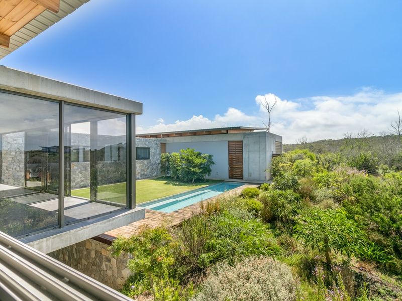 Contemporary Linear Pezula Private Estate home with an eco friendly focus. - Photo 7