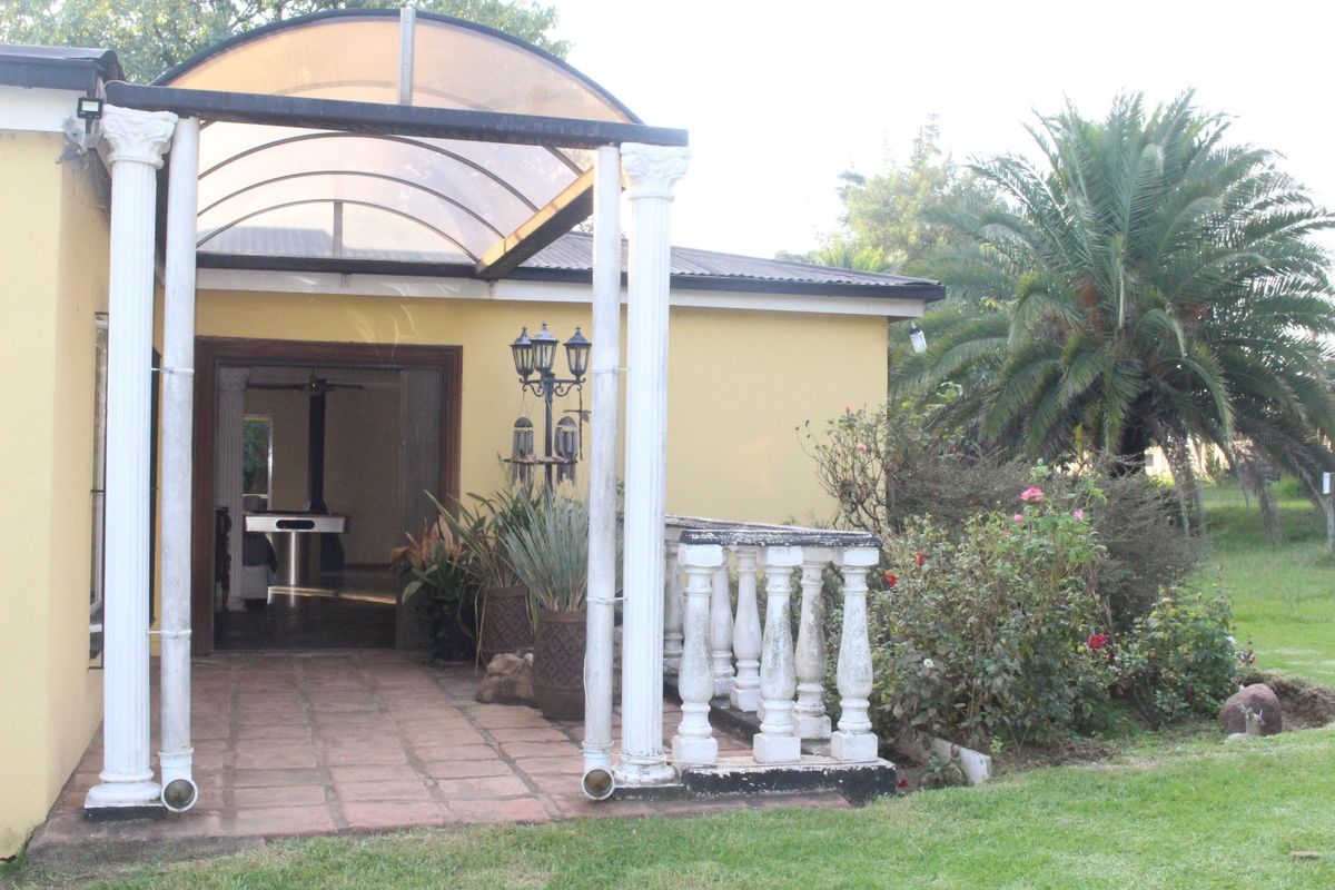 Beautiful 3-bedroom home on a 2-hectare plot with a heated swimming pool, three outbuildings, and a flatlet this is a fantastic investment opportunity.  Why This Property Stands Out:  Spacious Living – The 3-bedroom house offers plenty of room for a family or rental income. Luxury & Comfort – A heated swimming pool adds a touch of elegance and year-round relaxation. Versatile Investment – The flatlet can generate rental income, serve as a guest suite, or even be a home office. Business Potential – With three outbuildings, there’s space for workshops, storage, or even additional rental units. Prime Location – A 2-hectare plot offers privacy, space for expansion, or farming potential.  This property is ideal for investors, families looking for space, or someone wanting to generate extra income. - Photo 5