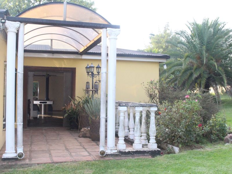 Beautiful 3-bedroom home on a 2-hectare plot with a heated swimming pool, three outbuildings, and a flatlet this is a fantastic investment opportunity.  Why This Property Stands Out:  Spacious Living – The 3-bedroom house offers plenty of room for a family or rental income. Luxury & Comfort – A heated swimming pool adds a touch of elegance and year-round relaxation. Versatile Investment – The flatlet can generate rental income, serve as a guest suite, or even be a home office. Business Potential – With three outbuildings, there’s space for workshops, storage, or even additional rental units. Prime Location – A 2-hectare plot offers privacy, space for expansion, or farming potential.  This property is ideal for investors, families looking for space, or someone wanting to generate extra income. - Photo 5