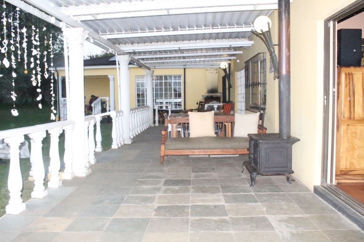 Beautiful 3-bedroom home on a 2-hectare plot with a heated swimming pool, three outbuildings, and a flatlet this is a fantastic investment opportunity.  Why This Property Stands Out:  Spacious Living – The 3-bedroom house offers plenty of room for a family or rental income. Luxury & Comfort – A heated swimming pool adds a touch of elegance and year-round relaxation. Versatile Investment – The flatlet can generate rental income, serve as a guest suite, or even be a home office. Business Potential – With three outbuildings, there’s space for workshops, storage, or even additional rental units. Prime Location – A 2-hectare plot offers privacy, space for expansion, or farming potential.  This property is ideal for investors, families looking for space, or someone wanting to generate extra income. - Photo 2