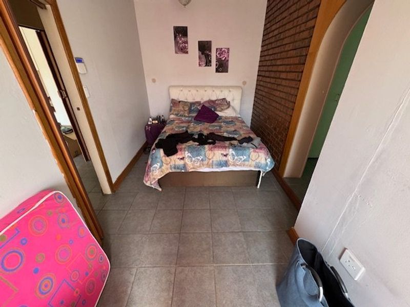 Modern 3-Bedroom Home with Granny Flat and Pool - Photo 9