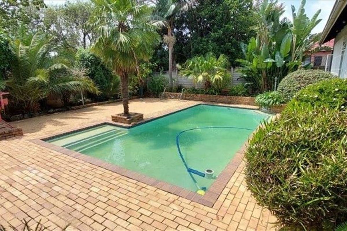 Impressive 3-Bedroom Home with Pool, Staff Quarters, and Ample Parking - Photo 3