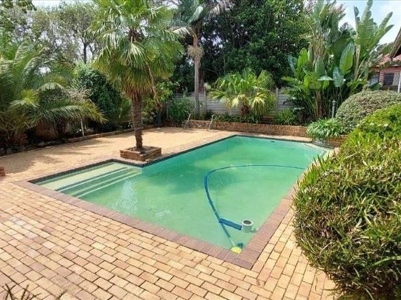 Impressive 3-Bedroom Home with Pool, Staff Quarters, and Ample Parking - Photo 3